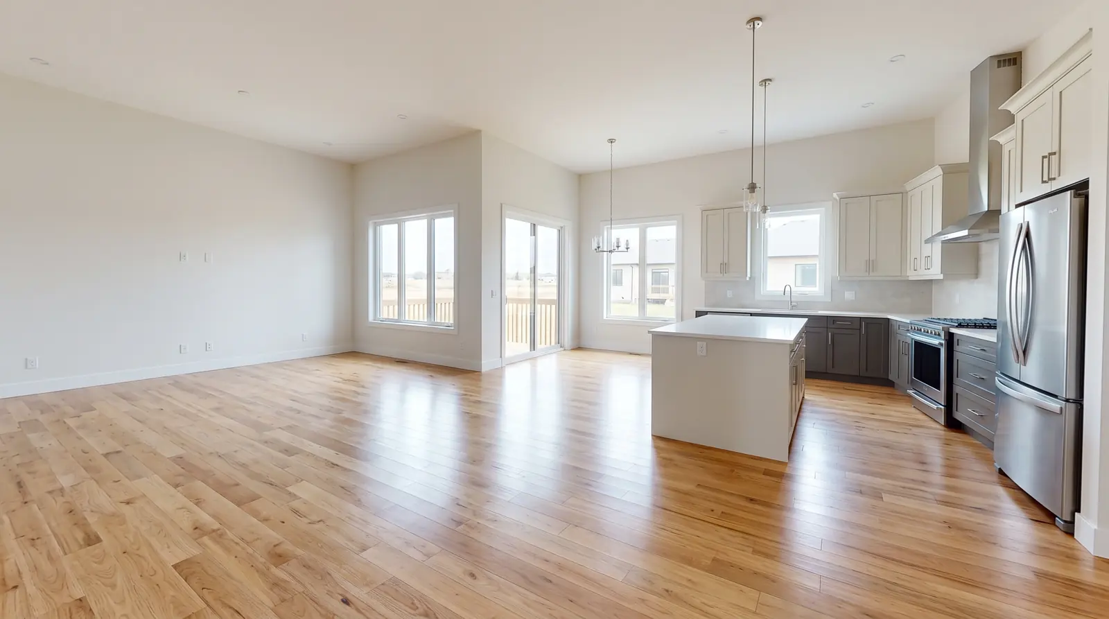 Builder and General Contractor Cleaning | Music City Cleaner A newly built home interior ready for the final walkthrough with spotless floors, clear windows and a clean kitchen with new cabinets